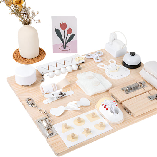 A beautiful Montessori inspired busy board. Sixteen sensory activities, wood, with white and metal finishings.