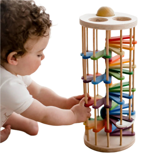 A beautiful wooden toy. Insert a ball on the top, smash it with a wood hammer, and watch it roll down a vibrant spiral staircase.