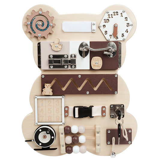 Montessori-inspired busy board. Wooden with eleven sensory activities