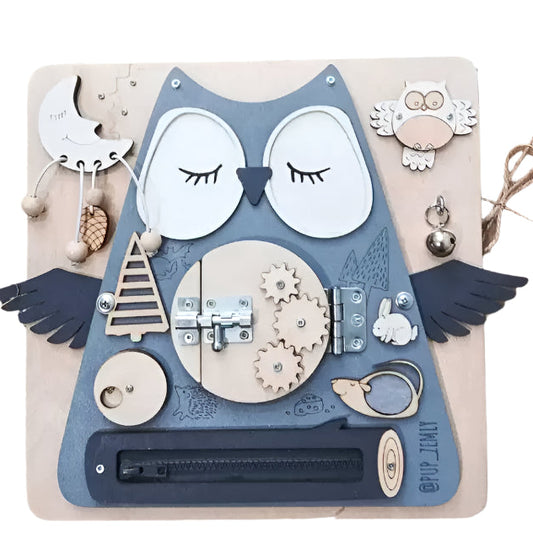 Montessori-inspired wooden owl busy board with eight activities.